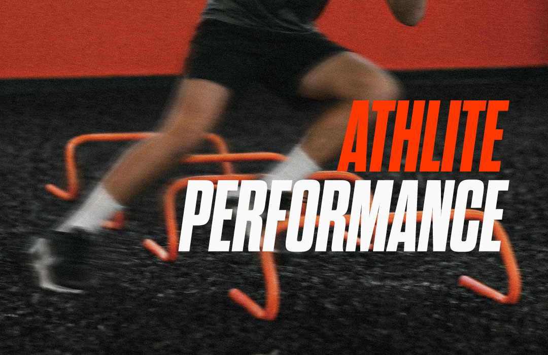 An athlete doing zig-zag drill on a black color turf indoor at Athlite performance training center